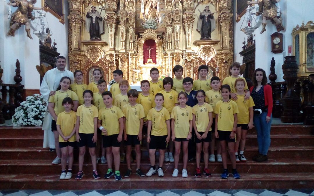 Imposición de medallas y escapularios